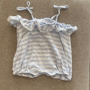 Great quality romper with ruffles on the top